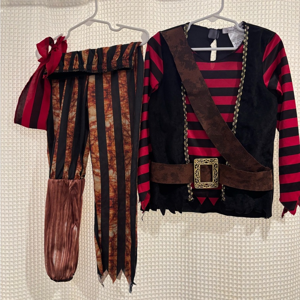 Chasing Fireflies Red and Black Pirate Costumes.
One boy’s one girl’s.